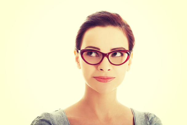 Portrait of beautiful woman in red eyeglasses. - Zdjęcie, obraz