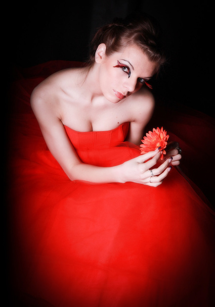 Beautiful girl in a gorgeous red crinoline - Фото, изображение