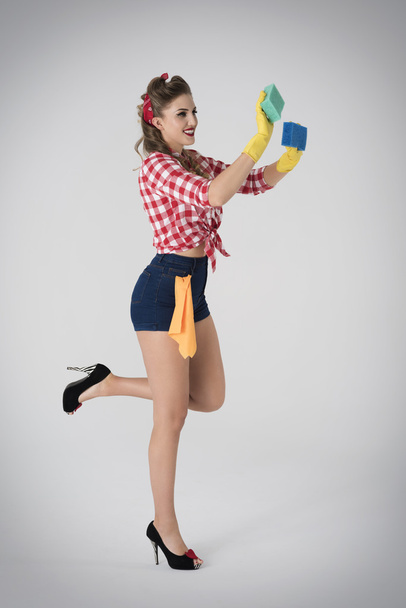 Pin up girl leaning in high heels - Photo, Image
