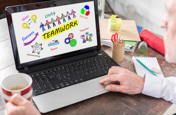 Concept of teamwork on a laptop screen - Фото, зображення