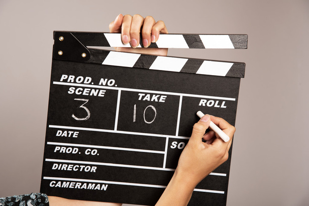 Writing on a film set clapper board - Photo, Image