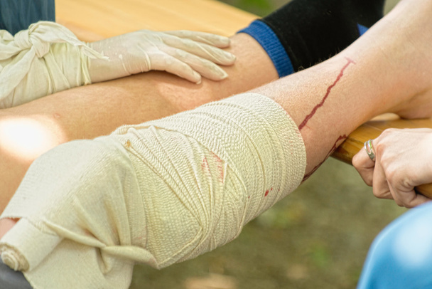 First aid injury treatment - Foto, Imagem