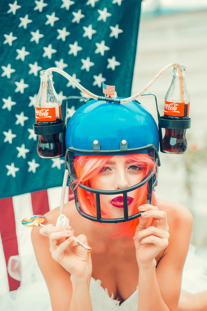 independence day woman with flag and drink helmet - Φωτογραφία, εικόνα
