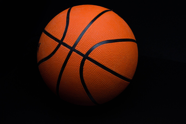 basketball on a black background - Foto, afbeelding