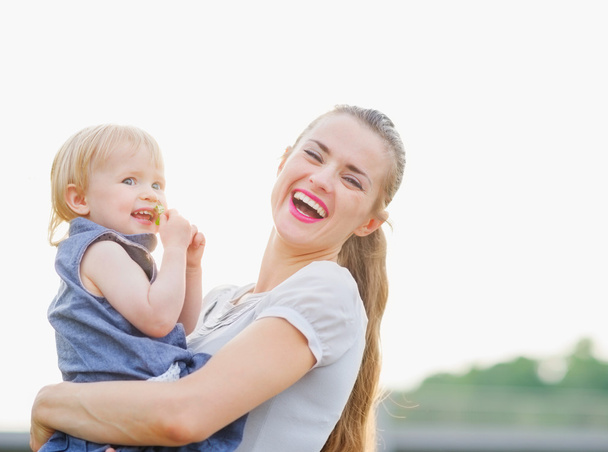 Portrait of happy mother with baby - Photo, Image