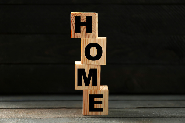 Word HOME on wooden cubes - Фото, изображение