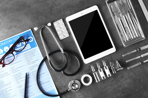 Medical tools set with tablet  - Фото, изображение
