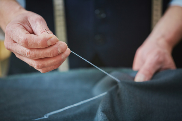  tailor sewing with needle  - Photo, Image