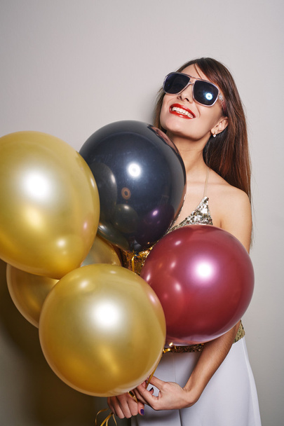 happy woman with balloons - 写真・画像