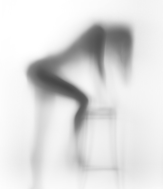 Mysterious dancer and chair - Foto, afbeelding
