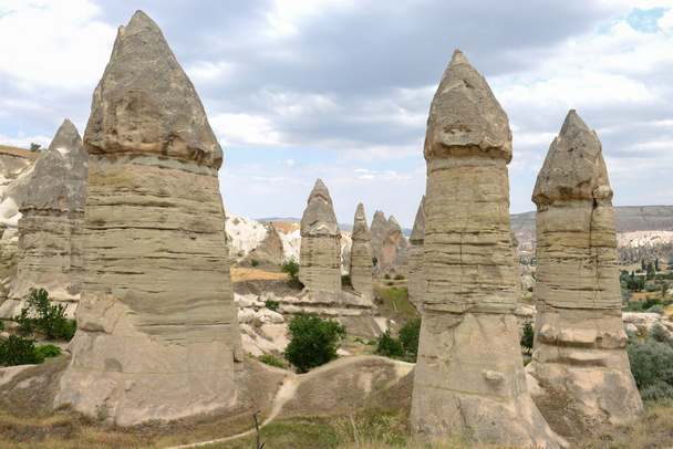 upright conical stone formations - Photo, Image