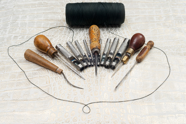 Leather craft tools on background. Craftsman work desk. - Photo, Image