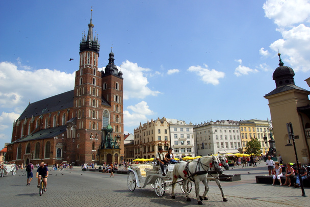 St Mary's Church,Kosciol Mariacki, at the main Market Square in Cracow, Poland - Photo, Image