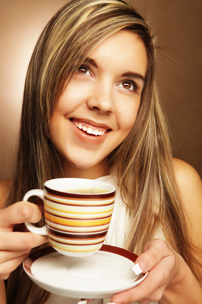 young pretty woman drinking coffee - Fotoğraf, Görsel
