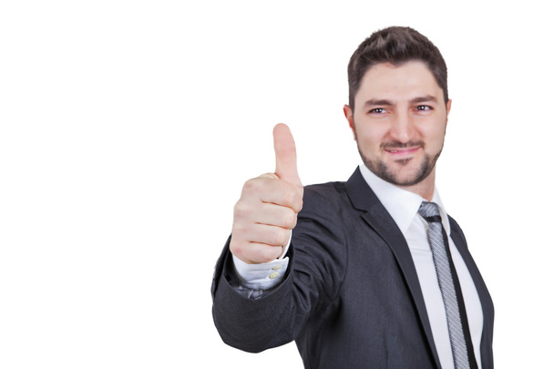Businessman giving thumbs up - Photo, Image