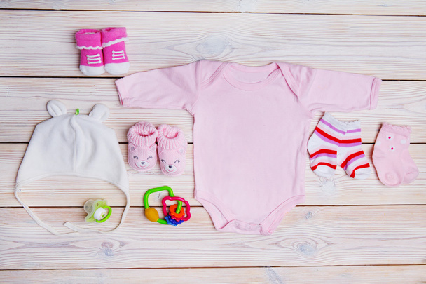 top view set of fashion trendy pink stuff for baby girl, baby fashion concept - Foto, imagen