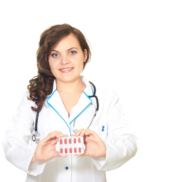 Doctor smiling girl holding a tablet - Foto, Imagen