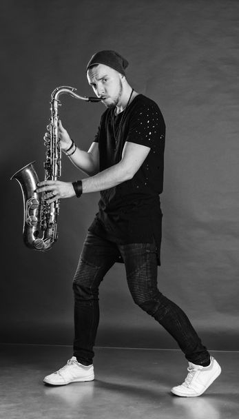 Young stylish saxophonist - Fotoğraf, Görsel