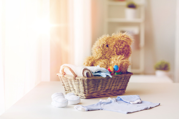close up of baby clothes and toys for newborn - Fotoğraf, Görsel