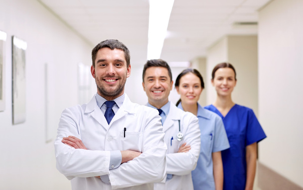 group of happy medics or doctors at hospital - 写真・画像