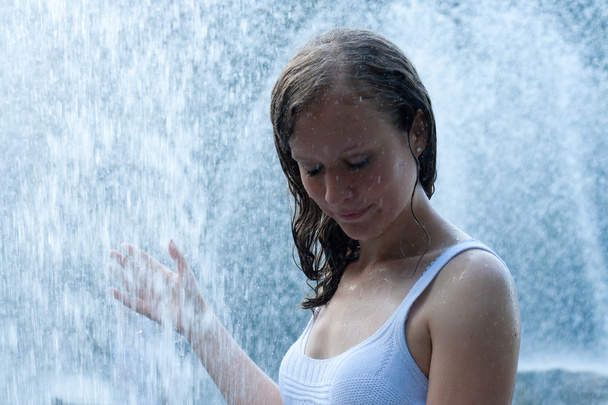 Beautiful girl bathing in a fountain - Zdjęcie, obraz