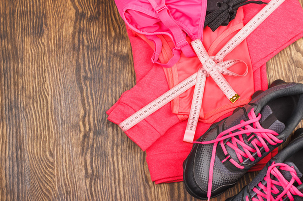 Sports sneakers and sports bra - 写真・画像
