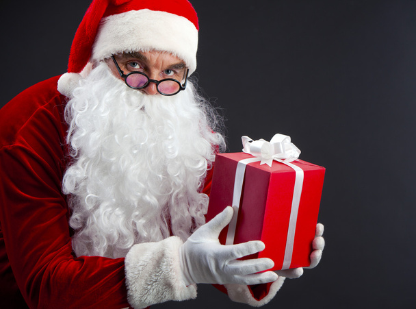 Santa with present - Фото, изображение