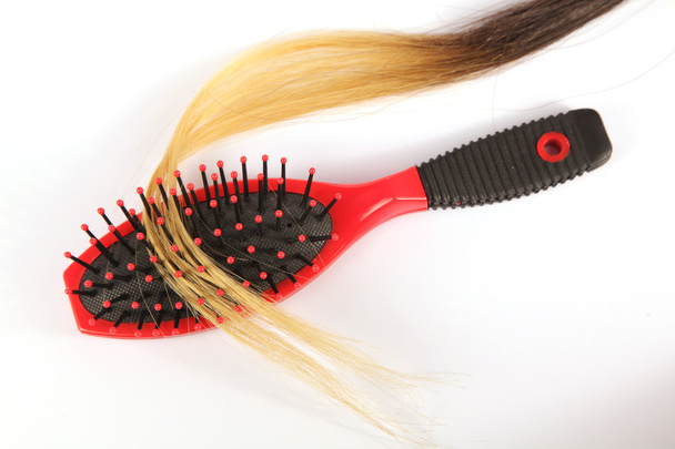 cepillo rojo el cabello con un rizo de pelo sintético
 - Foto, imagen