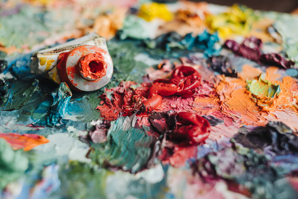 Artists oil paints on wooden palette. - Fotó, kép