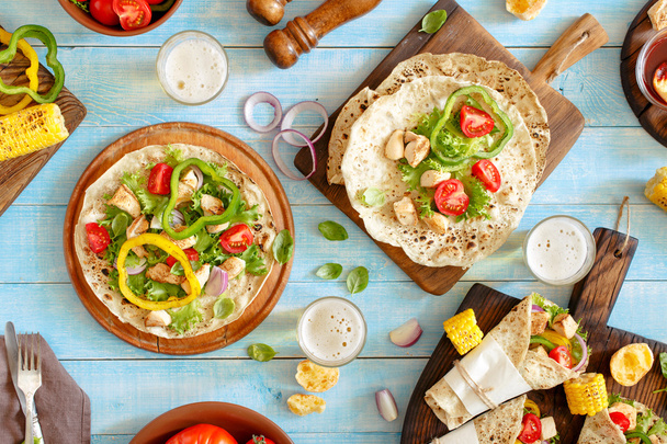 Tortilla with grilled chicken fillet, lager and grilled vegetabl - Фото, зображення