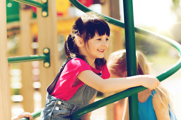 group of happy little girls on children playground - Fotó, kép
