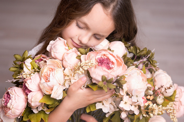 beautiful girl with long hair and flowers - 写真・画像