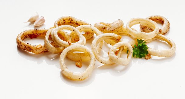 calamari sauteed in garlic - Photo, Image