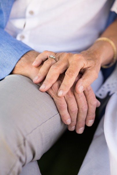 Couple holding hands - Foto, immagini