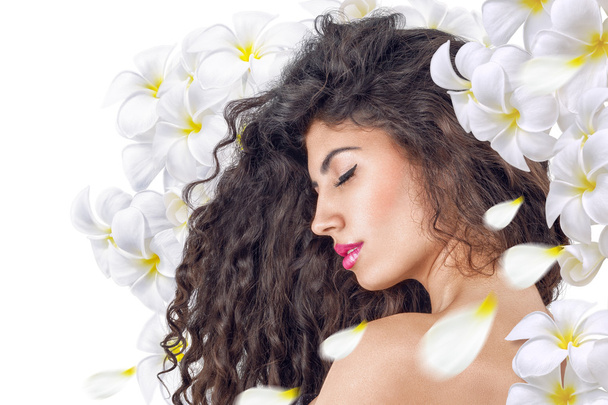 Woman dreaming with flowers - Photo, Image