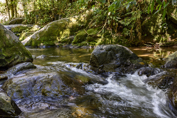 River running through the rocks - Фото, изображение
