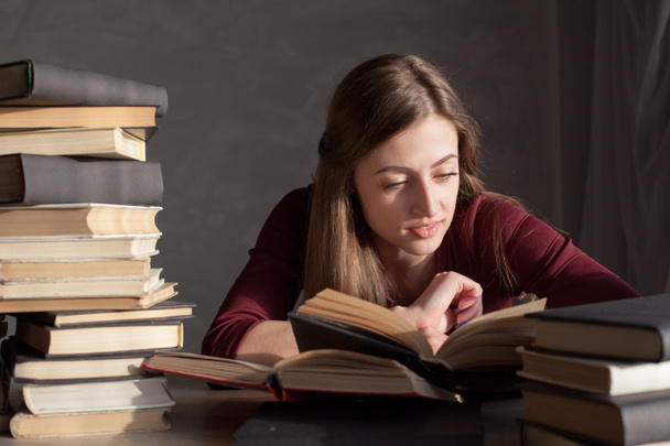girl is preparing for the exam and reads - Photo, Image
