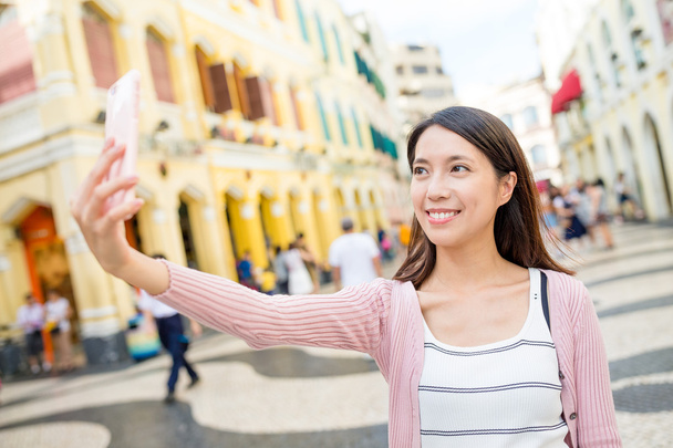 Woman taking photo by mobile phone - Photo, image