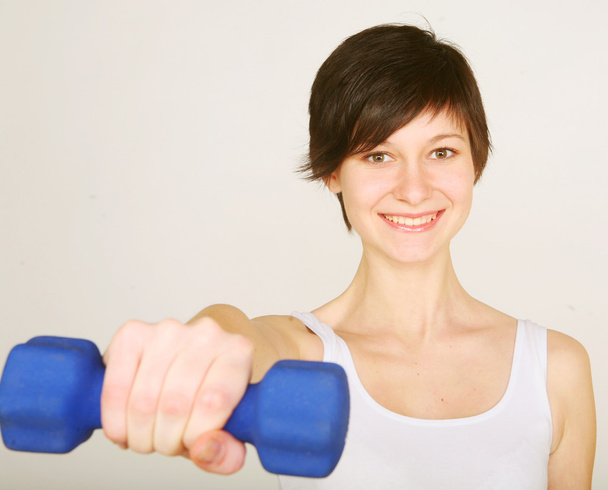 fitness woman lifting weights - Фото, зображення
