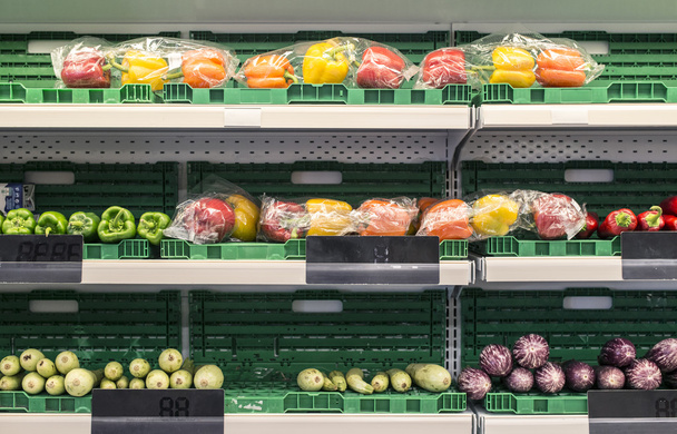 Fruits and vegetables in supermarket - Фото, изображение