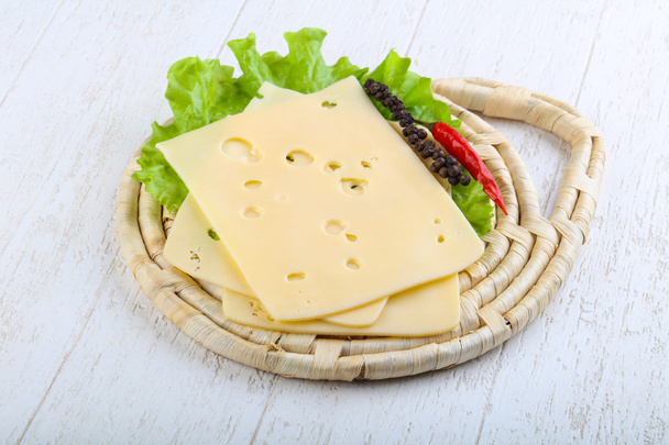 Delicioso queso en rodajas
 - Foto, Imagen