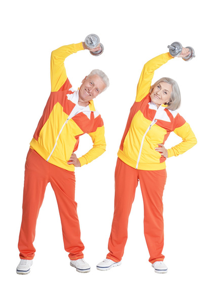 Senior Couple Exercising with dumbbells - Foto, Imagem