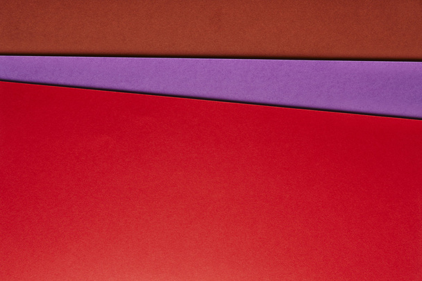 Colored cardboards background in red purple brown tone. Copy spa - Photo, image