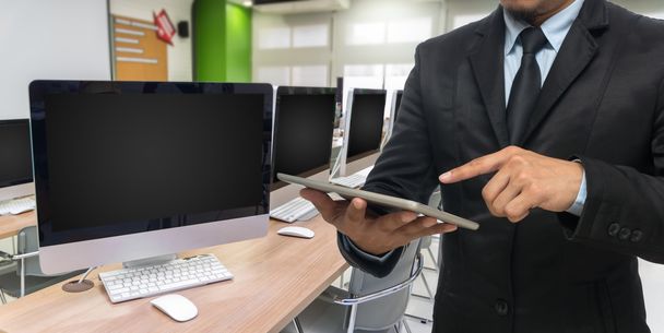 Businessman using tablet  - Photo, Image