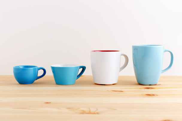 Mug and cup on wood table - Photo, Image