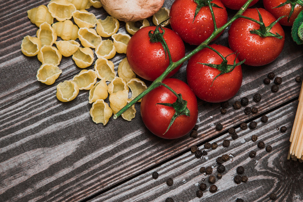 Fresh Italian food on wooden background. - Fotó, kép