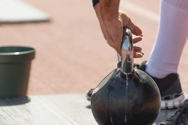 male hand with Kettlebell - Photo, Image
