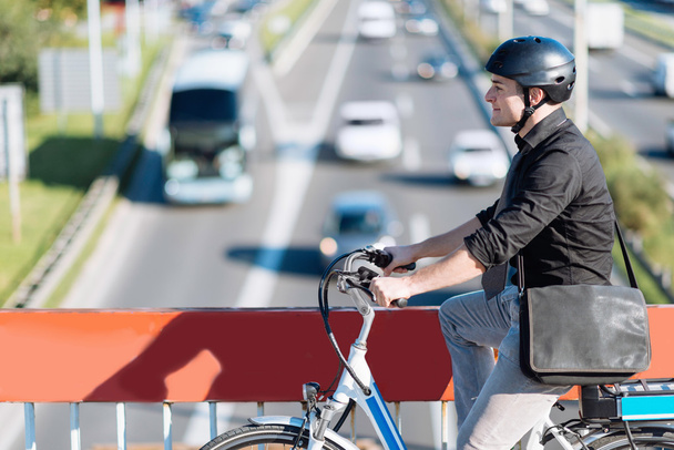 male Commuter riding e-bike - Photo, Image