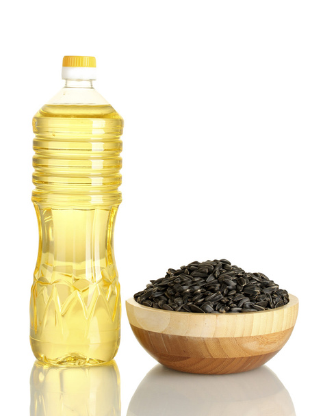 Sunflower oil with sunflower seeds isolated on white background - Valokuva, kuva