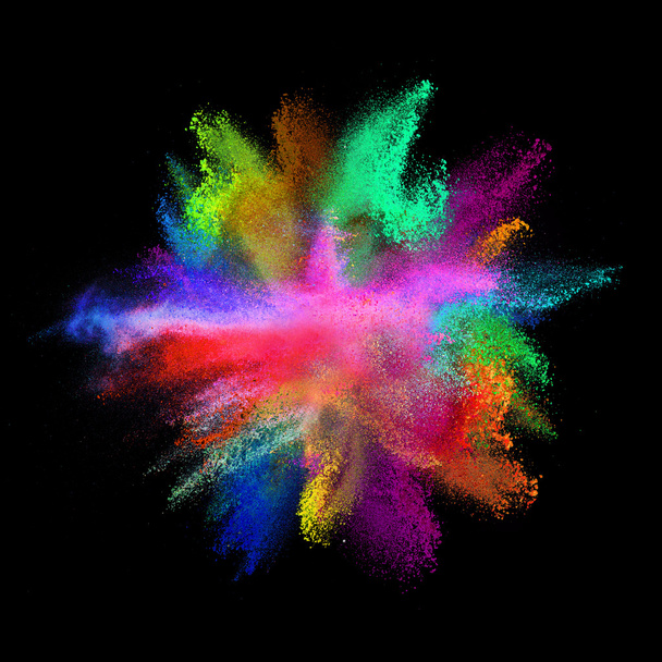 Explosion of colored powder on black background - Фото, зображення